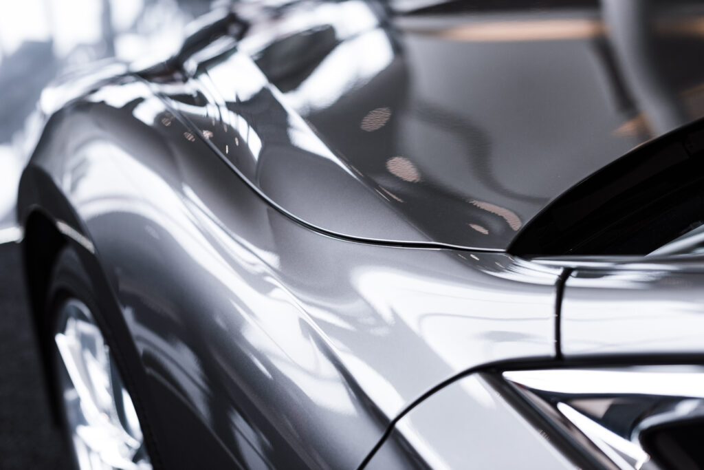 close up view of luxury shiny car in auto salon