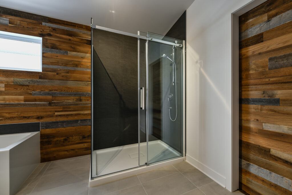 Modern bathroom with barn wood European shower